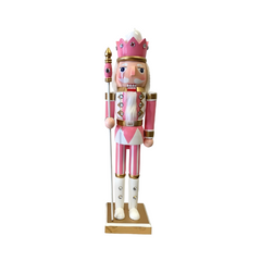 14-inch pink and gold wooden nutcracker figure on a wooden base