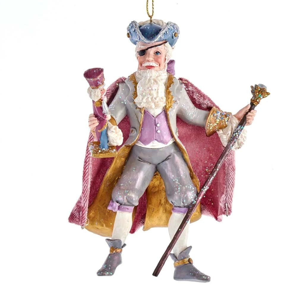 Kurt Adler E0426D Drosselmeyer ornament holding a nutcracker, hanging from a pink ribbon