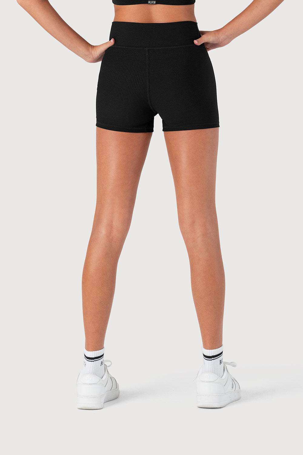 Child wearing Bloch D55768G rib striker shorts for dance and active play