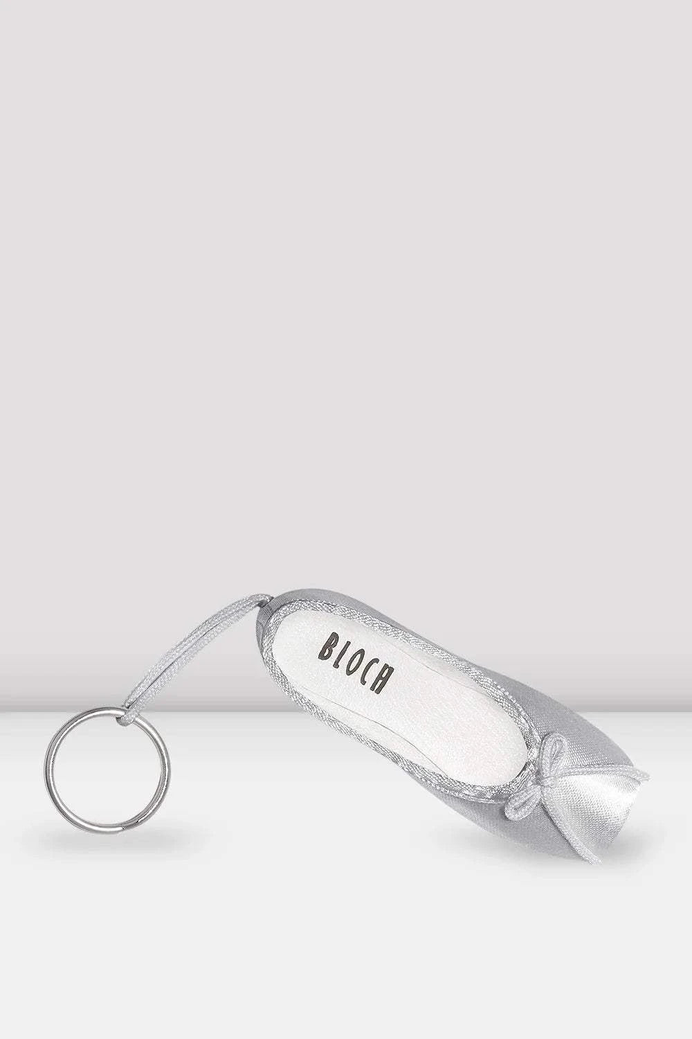 Bloch Mini Pointe Shoe Keychain in silver satin material with a small bow and metal key ring attachment