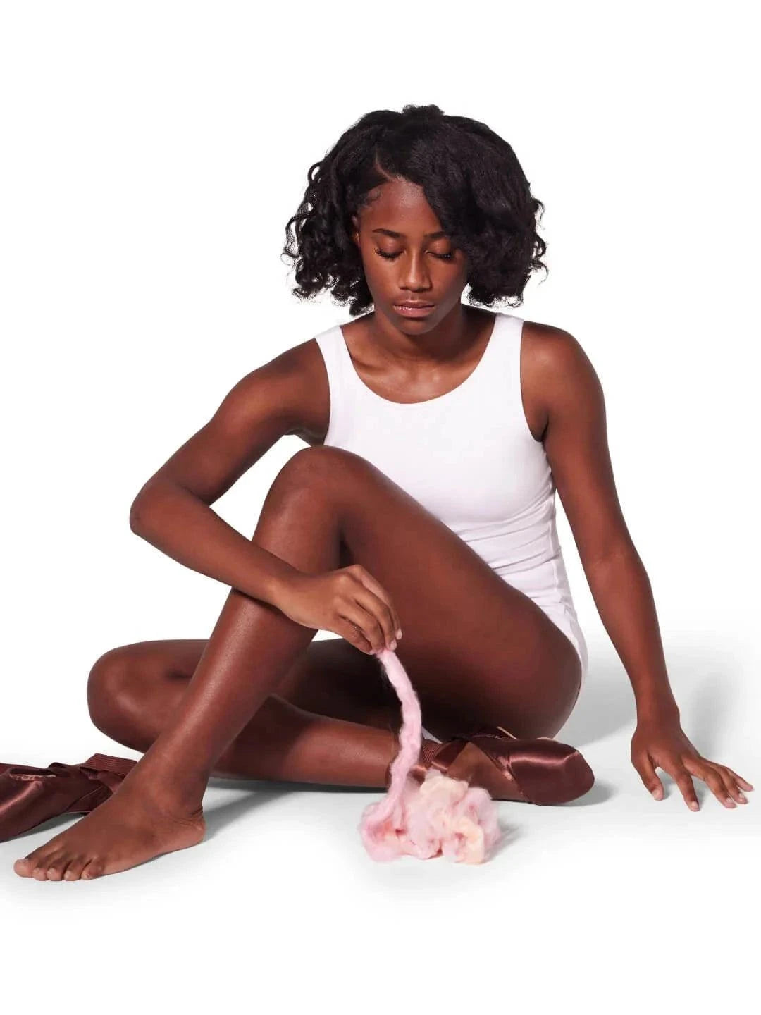 Capezio Bunheads Bamboo Lamb’s Wool soft pink bamboo fiber shown with dancer wearing white tank leotard