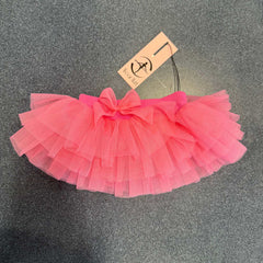 Child wearing Wear Moi Nuage tutu ballet skirt with glittering tulle and bow