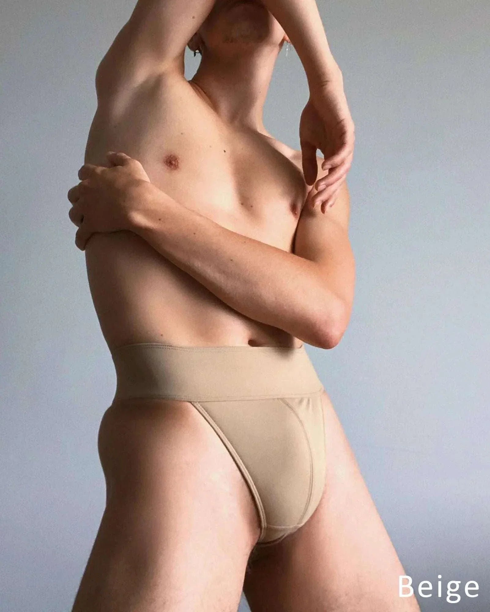 Dance Jox Thong dance belt in beige stretch fabric, with a wide waistband and padded front panel