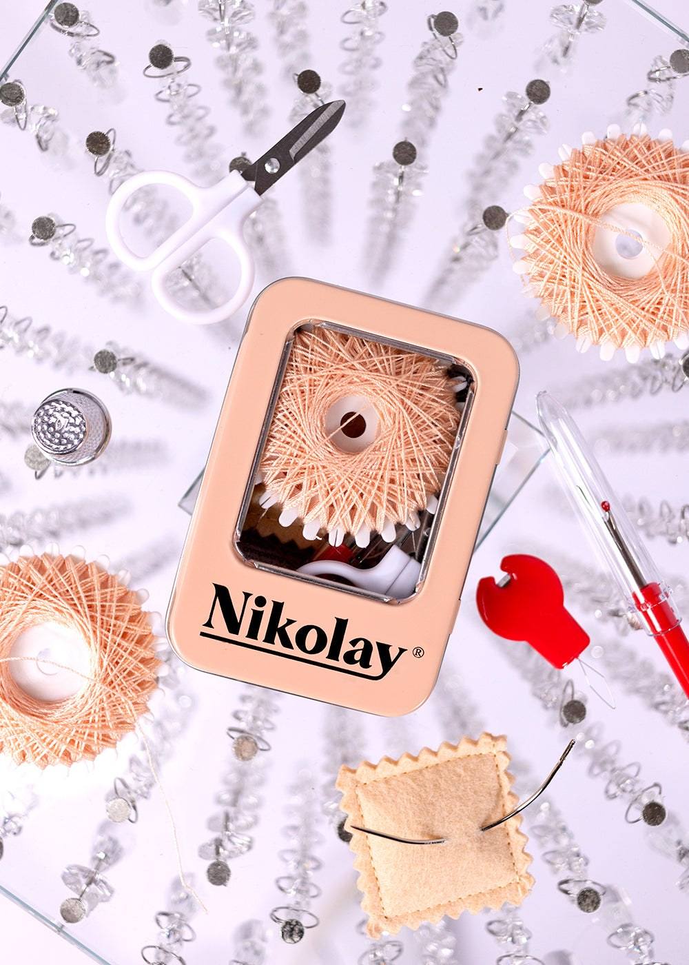 Compact premium sewing kit with needles scissors and thread